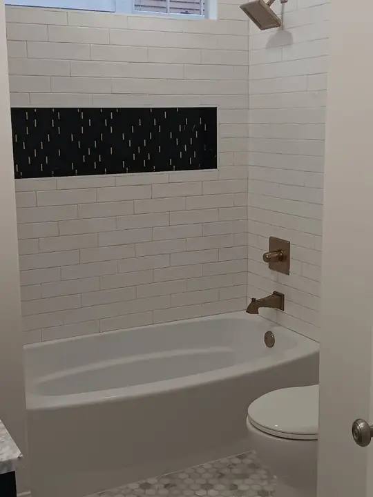 Small white bathtub, a TurnKey Bath Remodel project in New Orleans