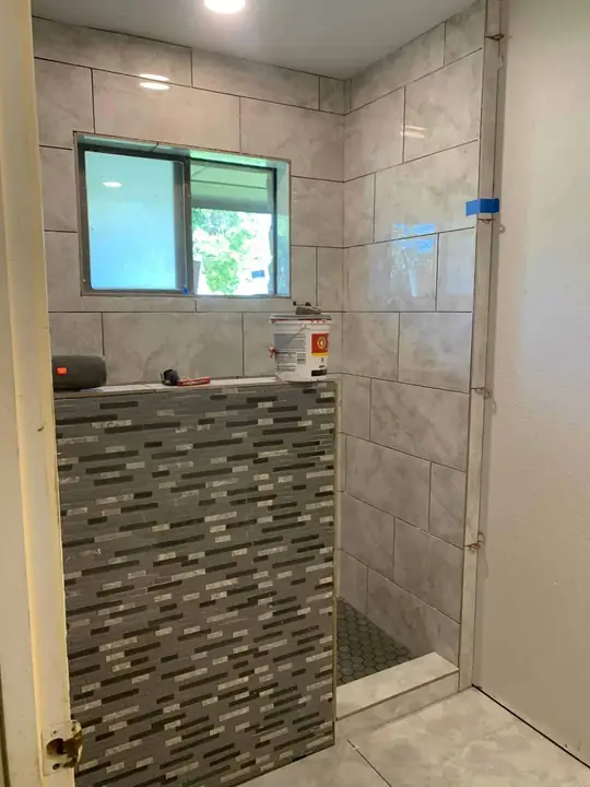 Bathroom walls with tile, a TurnKey Bath Remodel project in New Orleans