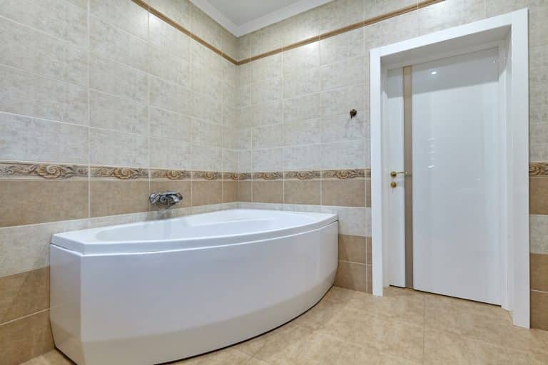 Remodeled bathroom with a corner tub in New Orleans