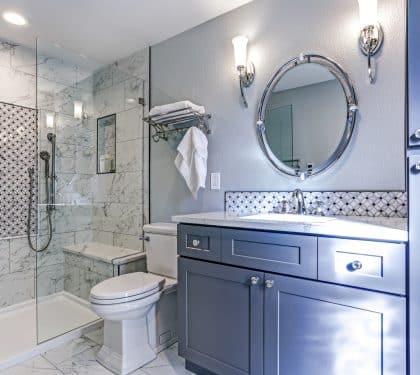Remodeled bathroom with a glass walk-in shower in New Orleans