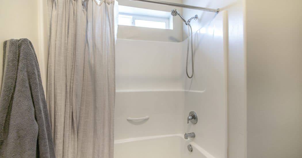 Shower and tub plumbing in a New Orleans bathroom
