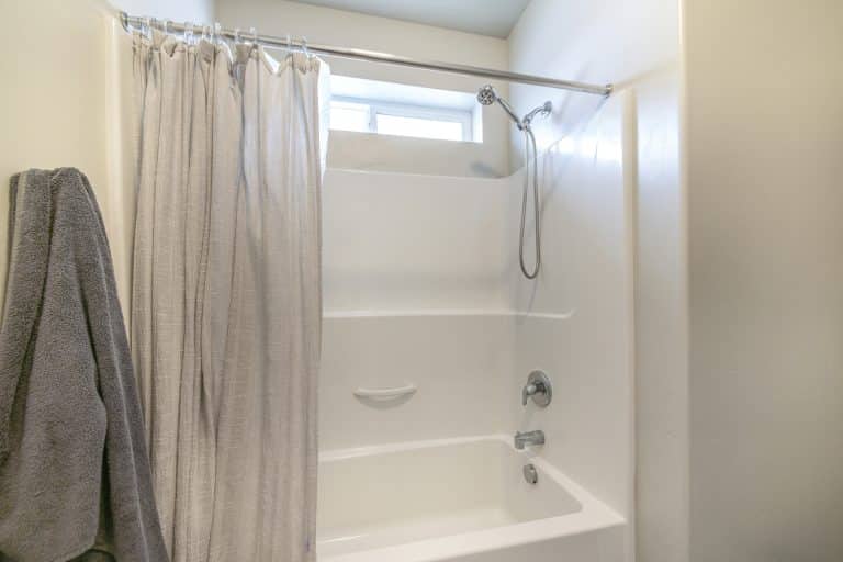 Bathroom with a tub and shower combination in a New Orleans home