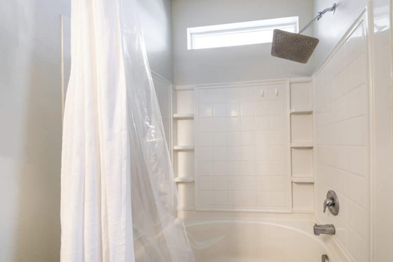 Shower liner installation in a New Orleans bathroom