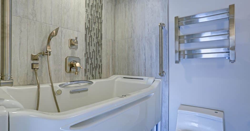 Walk-in tub with grab bars for seniors in New Orleans