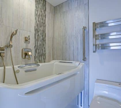 Walk-in tub with grab bars for seniors in New Orleans