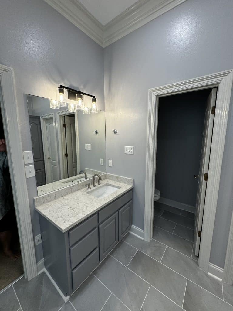 Huge Mirror and a sink - Turnkey Bath Remodel