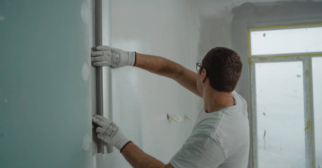 A professional remodeling contractor working carefully during a home renovation in New Orleans