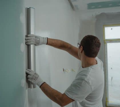 A professional remodeling contractor working carefully during a home renovation in New Orleans